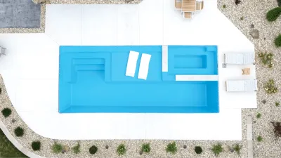Azoria Mack Daddy fiberglass pool installed in a backyard